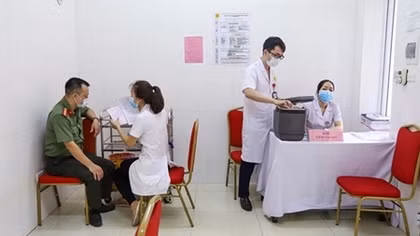 Public security officers get vaccinated against COVID-19