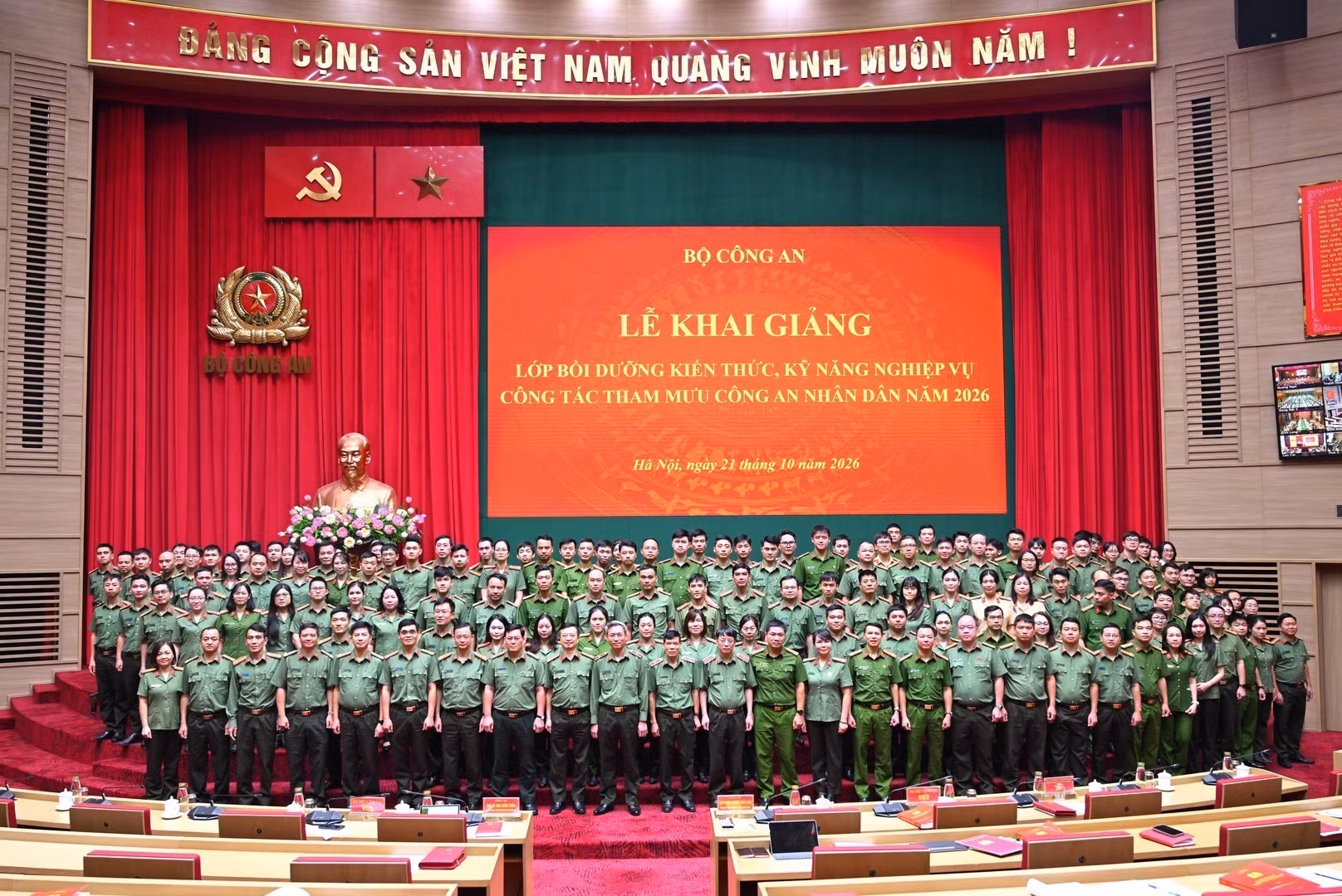Delegates pose for group photo.