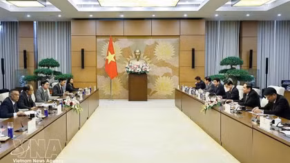 The meeting between Chairman of the National Assembly Tran Thanh Man and Attorney General of Malaysia Tan Sri Mohd Dusuki Mokhtar in Hanoi on July 7 (Photo: VNA)