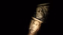 Dollar edges away from recent lows with French vote in focus