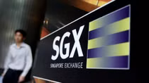 Asia stocks weaker, dollar slips as Fed continues to weigh