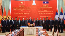 Minister To Lam pays a working visit to Laos 