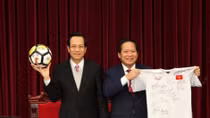 PM presents U23 team’s ball, shirt for auction to raise funds for the poor