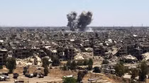 At least 38 killed in series of terror attacks in southern Syria 