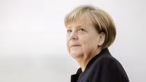 Germany's Merkel says she has not changed course on migrant policy