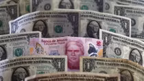 Dollar holds gains; Canadian dollar surge on NAFTA relief