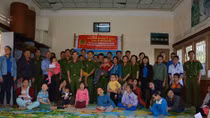 Youths of Economic Police Department present gifts to children with cerebral palsy 