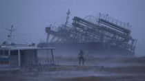 Powerful typhoon bears down on flood-battered Japan