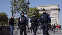 Paris gunman's criminal past in focus as police hunt second suspect