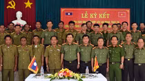 Vietnamese and Lao police forces ensure order security along shared border 