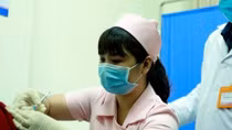 Six volunteers receive second jab of second local COVID-19 vaccine