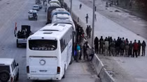 As Syrian rebels quit Ghouta, Douma stands alone