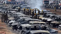 Fire at government-run airshow in India destroys hundreds of cars