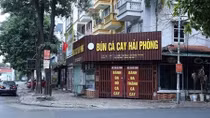 Hanoi orders closure of streetside stalls, religious sites