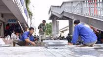 Some Hanoi sidewalks to be paved with stone