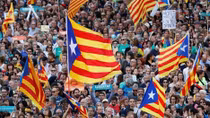 Catalonia's leaders fight off direct rule from Madrid