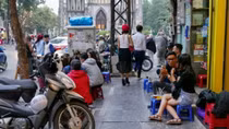 Hanoi to clear sidewalks of cars, beer joints