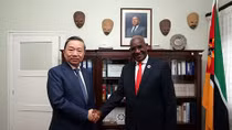 Minister To Lam meets with Minister of Justice, Constitutional and Religious Affairs