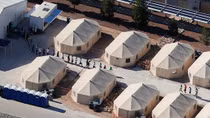 Trump backs down on separating immigrant children, legal problems remain