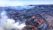 Utah wildfire levels 13 homes, forces evacuation of 1,500 people