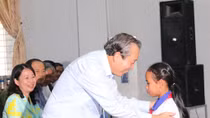 Permanent Deputy P.M presents bicycles to poor students