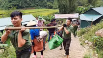 Youths of Cao Bang police join hands to build rural road