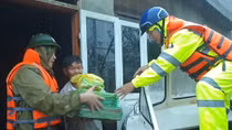 Public Security forces help local people in flooding