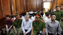12 accused in fake cancer medicine trading case brought to court