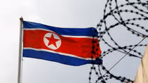 South Korea imposes sanctions on 18 North Koreans, a day before Trump visit