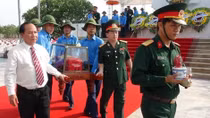 Quang Binh holds reburial service for remains of martyrs