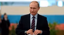 Putin's proposed U.N. Ukraine peacekeepers must have full access: Merkel