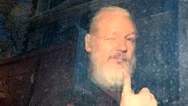 Ecuador's president says Assange tried to use its embassy to spy