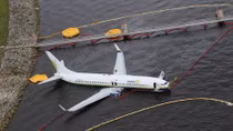 Probe begins after Boeing 737 slides off runway into Florida river