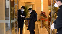 Nearly 100 more die from coronavirus in China, workers start to return to offices and factories