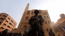 Gunman kills 11 in attacks on Coptic church, Christian-owned shop in Egypt