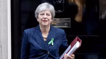 As Brexit talks progress, UK PM May struggles to find support at home