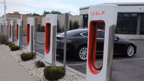 Tesla shares fall on warning of Model 3 bottleneck