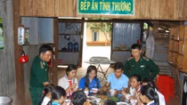 Border guard soldiers help teach students