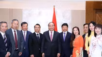 PM urges Vietnamese expatriates in Europe to promote solidarity