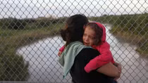 U.S. government says it will detain migrant children with parents