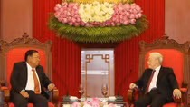 Party, State leader Nguyen Phu Trong welcomes Lao counterpart
