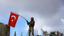Turkey orders 13 detained for online opposition to Syria offensive