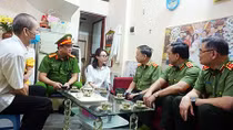 Minister To Lam visits family of police martyr Pham Cong Huy