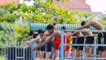 Teacher instructs poor students in mountainous area how to swim for free