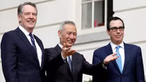 U.S. top trade negotiator praises deal, China remains cautious