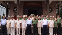 Minister To Lam works with Can Tho Police