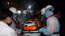 Sick Philippine sailor brought ashore for treatment