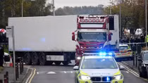 UK police charge another over Essex lorry deaths