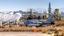 Putin signs Syria base deal, cementing Russia's presence there for half a century