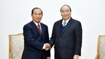 PM Phuc sanguine of growing Vietnam-Laos ties